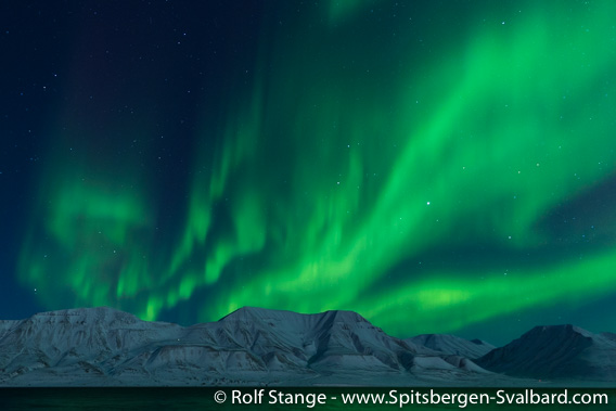 Polar night and northern light near Longyearbyen