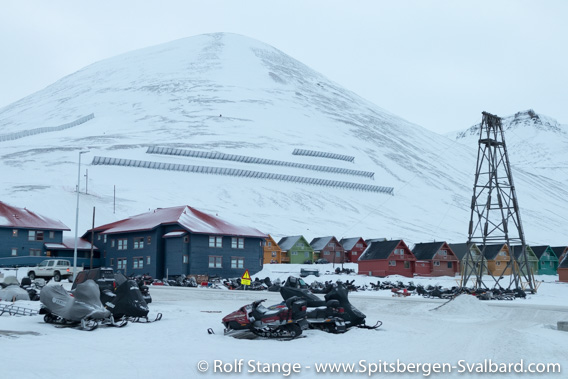 Residential houses, and avalanche barriers on Sukkertoppen