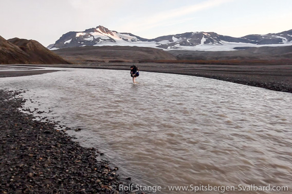 Crossing meltwater river near Grønfjordbreane